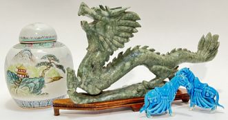 A Chinese carved soapstone dragon on stand (h- 19cm, w- 34cm), together with a Chinese porcelain gin