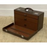 An early to mid 20th century stitched leather travelling vanity case, with swing handle over lid