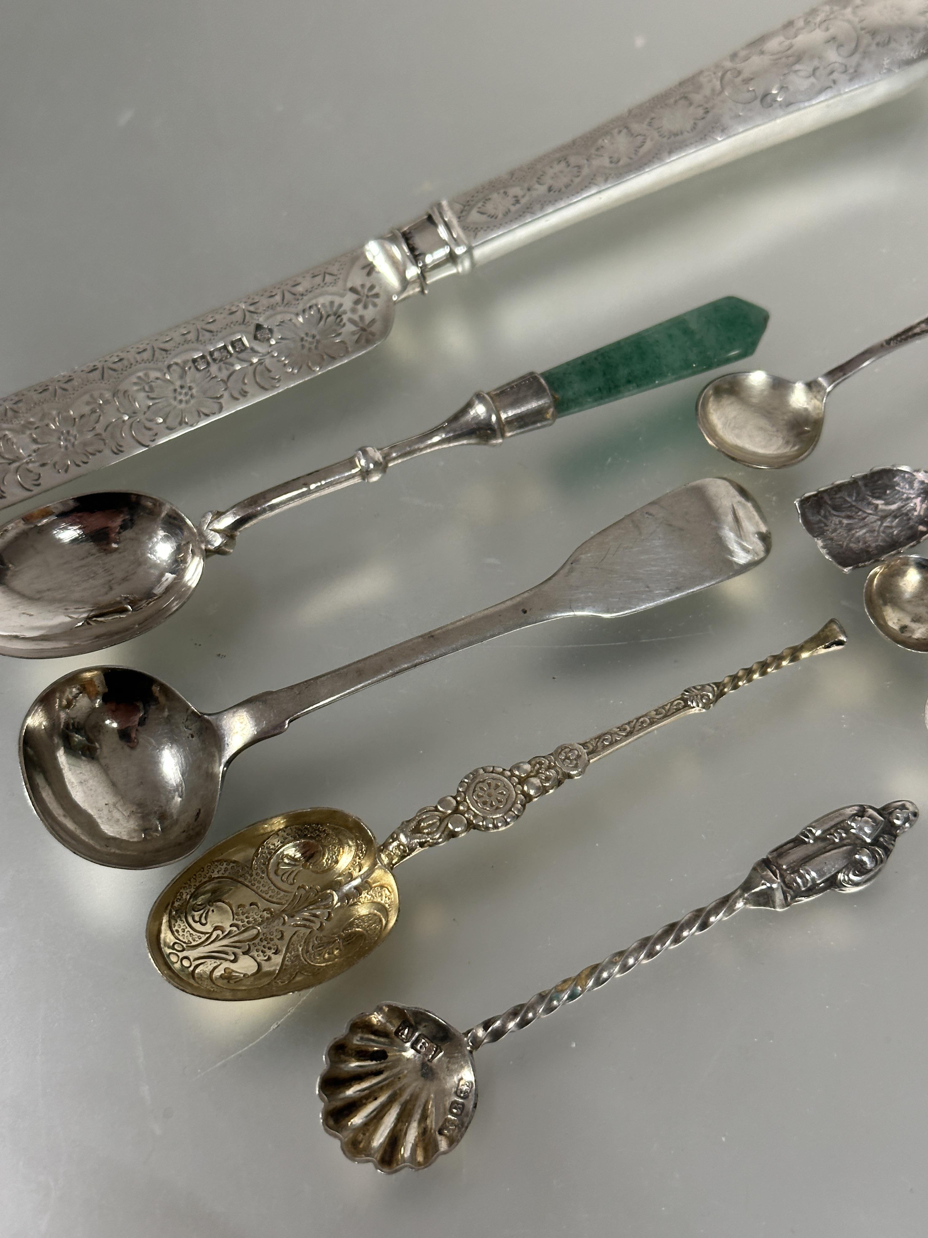 A collection of six various white metal and silver salt and mustard spoons, including a Georgian - Image 2 of 3