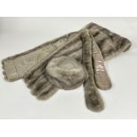 A Lady's 1960's - 70's grey Mink fur evening stole of tapered form with satin lining and embroidered