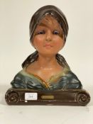 Unknown artist - An early 20th Century French Art Nouveau plaster bust of a young girl wearing a