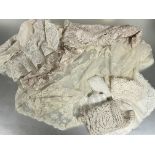 An Edwardian machine Brussels style lace scarf , the ends worked with scrolling leaves and