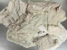 An Edwardian machine Brussels style lace scarf , the ends worked with scrolling leaves and