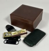 A brown textured leather covered Humidor with lined in cedar with brass hinges and holding brackets,
