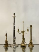 A group of four traditional style table lamps