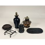 A brass rectangular kettle stand (5cm x 12cm x 14cm) and a Burns at the Plough cast iron panel,