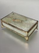 A Celladon jadeite rectangular box the top with pieced relief carved floral diagonal panels with