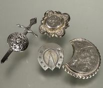 A Edwardian Birmingham silver square panel shaped brooch, a white metal crescent shaped brooch, a