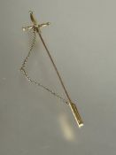 A late 19thc 15ct gold Renaissance sword style cloak pin of cruciform design with safety chain and