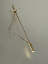 A late 19thc 15ct gold Renaissance sword style cloak pin of cruciform design with safety chain and