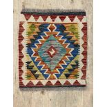 A Chobi kilim mat of geometric design 57cm x 46cm