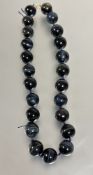 Property of the Late  Countess Haig: An imposing hawks eye large bead necklace, (Each bead 1.5 cm