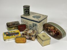 A collection of Vintage tins including Andy's Candys, Tam O' Shanter Tobacco, Kemps Assorted