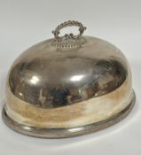 A large Epns oval domed meat dish cover with fixed beaded handle to top and beaded border to