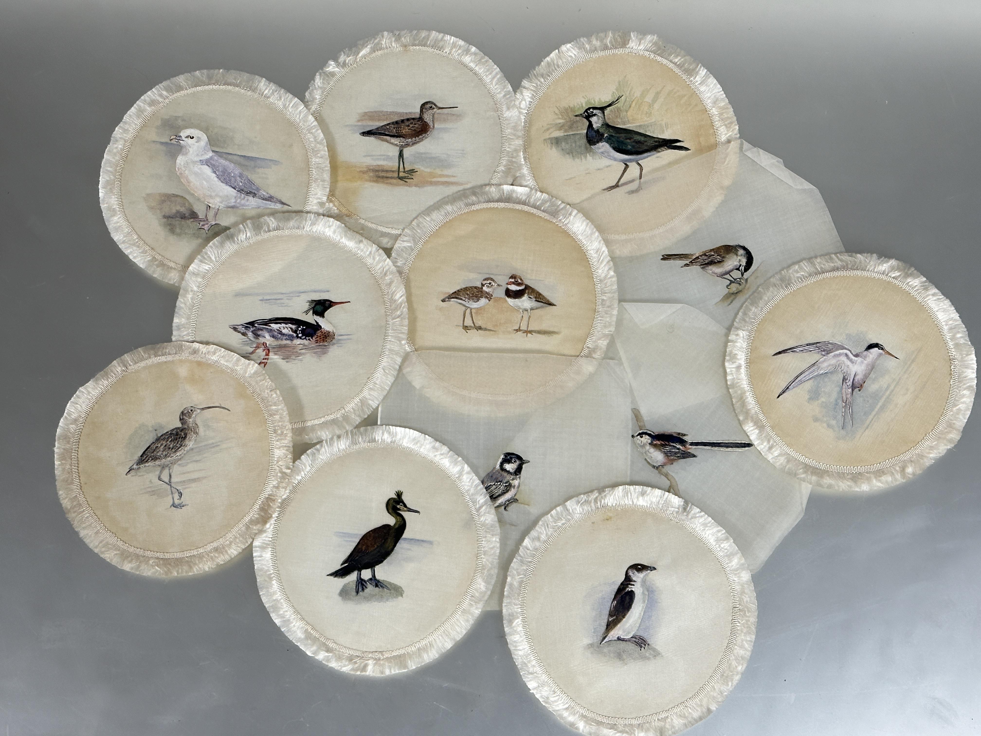 A set of 1920's hand painted dinner plate coasters of British birds on linen backed with silk and