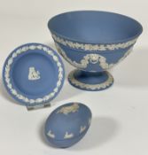 A Wedgwood pale blue jasper-ware rose bowl with classical lion ring masks joined with vine leaves