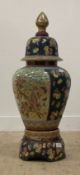 A Chinese porcelain baluster vase and cover on stand, decorated in polychrome enamels with floral