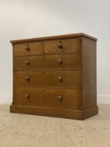 A Victorian ash chest, fitted with two short and three long drawers flanked by canted corners,