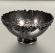 Property of the late Countess Haig: A white metal chased vine leaf and grape bordered bowl with