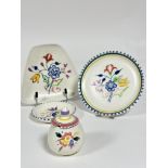 A collection of Poole pottery, including a mustard pot and cover, (H x 8 cm), a shaped dish and