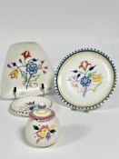 A collection of Poole pottery, including a mustard pot and cover, (H x 8 cm), a shaped dish and