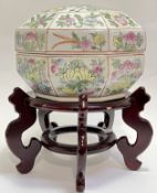 A large modern Chinese porcelain lidded container with polychrome enamelled decoration of birds and