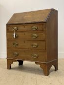 An Edwardian inlaid mahogany bureau, the fall front opening to a fitted interior, above four