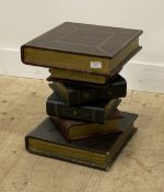 A vintage lamp table formed as a stack of leather bound books. H44cm.