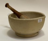 A large stoneware pestle and mortar, the pestle with a turned and stained beech handle (D28cm)