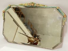 A vintage wall mounted Barbola mirror with octagonal bevelled glass mirror and floral decoration