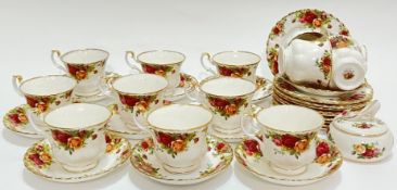 A Royal Albert 'Old Country Roses' part tea service comprising thirteen cups, ten saucers, ten small