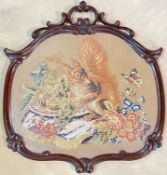 A framed pictorial needlepoint of a red squirrel and butterfly on a table of fruit (h- 68cm, w- 65cm