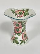 A Wemyss ware pottery wavy rim flared vase decorated with Briar Rose design and classic green rim,