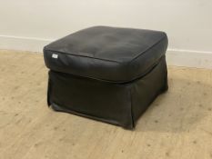 A modern black leather upholstered foot stool moving on castors. H42cm