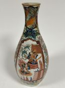 A late nineteenth century Meiji period porcelain vase of tapering ovoid form with decoration of