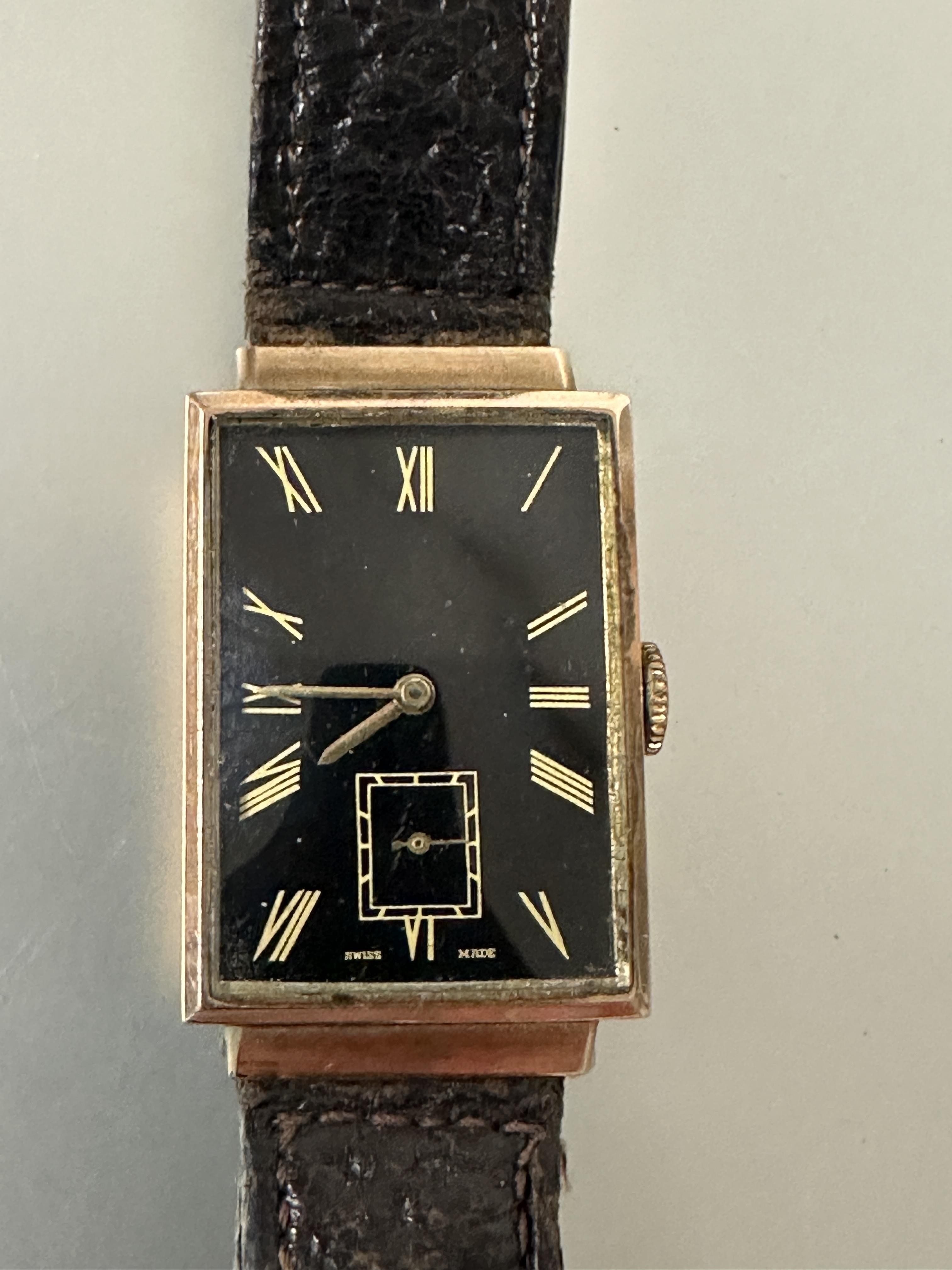 A gents 9ct gold cased 1930s Tank shaped wristwatch with black enamel dial and gilt roman numerals - Image 2 of 7