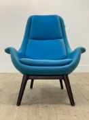 Steijer, a Danish lounge chair, the seat upholstered in sky blue wool, raised on turned and