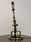 An early 20th century brass pullman table lamp, the articulated column raised on three splayed