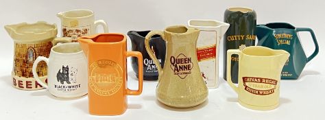 A mixed group of advertising (mainly Whisky) ceramic water jugs comprising Quen Anne, Chivas