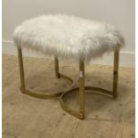 A contemporary vanity stool, with faux sheepskin upholstered seat raised on gilt box section