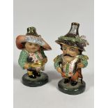 A set of two Royal Crown Derby Mansion House figures, decorated in traditional Crown Derby style