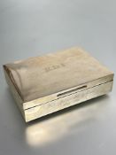 A London silver rectangular cigarette box with ceder lined interior and engraved inscription and