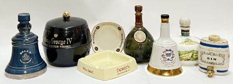 A group of advertising ceramics (mainly whisky) comprising bottles and ashtrays (Bell's, Dewars,