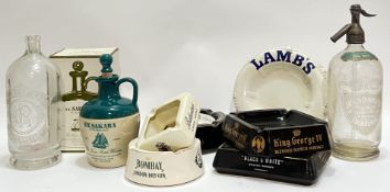 A group of advertising ceramics including bottles and ashtrays comprising Lamb's Rum, Black and