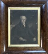 A 19thc engraving of a seated gentleman enclosed within a rosewood moulded frame, damage to