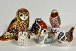 A collection of Royal Crown Derby bird paperweights including, a Short Eared Owl, an Owlet, a