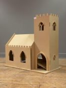 A kit built MDF dolls house model church (unfinished) with castellated roof and tracery window