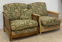 Ercol, a vintage pair of elm and ash bergere lounge chairs, each with seat and back upholstered in