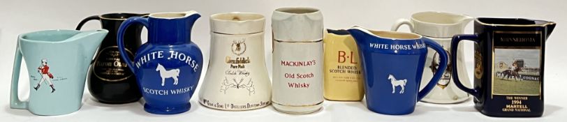A mixed group of Whisky/Cognac advertising ceramic water jugs comprising Martell Grand National