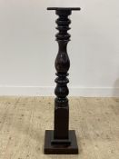 A Victorian stained mahogany jardinière stand, the square top raised on baluster turned and block
